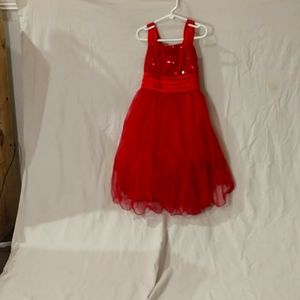 Dress brand is My Michelle the size is 10 and the color is red .